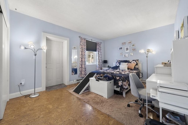 151 W 6th St Unit 1, Boston, MA 02127 - bedroom featuring baseboard heating and baseboards