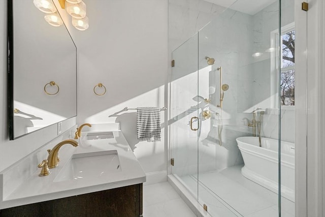 bathroom featuring plus walk in shower, vanity, and tile patterned floors