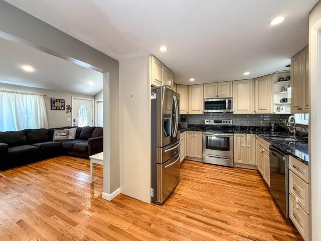 1 Fieldstone Way, Hopedale, MA 01747 - kitchen featuring stainless steel appliances, a sink, open shelves, open floor plan, and decorative backsplash
