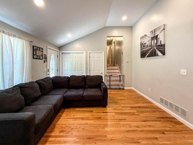 1 Fieldstone Way, Hopedale, MA 01747 - living room with vaulted ceiling, light wood-style flooring, baseboards, and recessed lighting