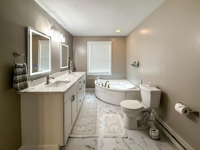 1 Fieldstone Way, Hopedale, MA 01747 - full bathroom with marble look tile flooring, toilet, a garden tub, double vanity, and baseboards