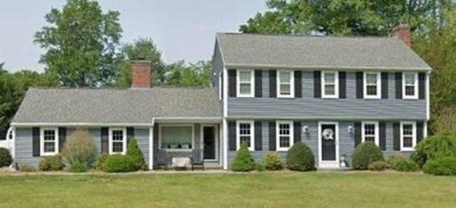 7 Scenic Dr, Wilbraham, MA 01095 - colonial home featuring a front yard and a chimney