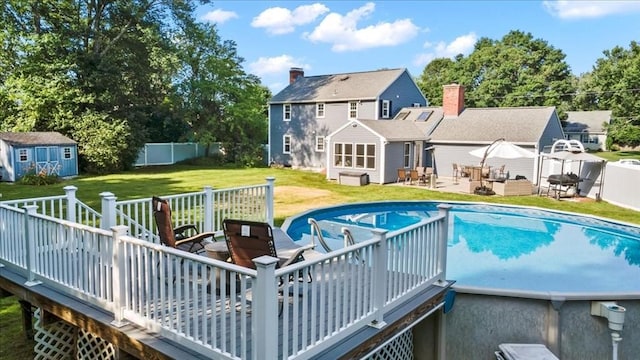 7 Scenic Dr, Wilbraham, MA 01095 - view of pool with a deck, a shed, a fenced backyard, and a residential view