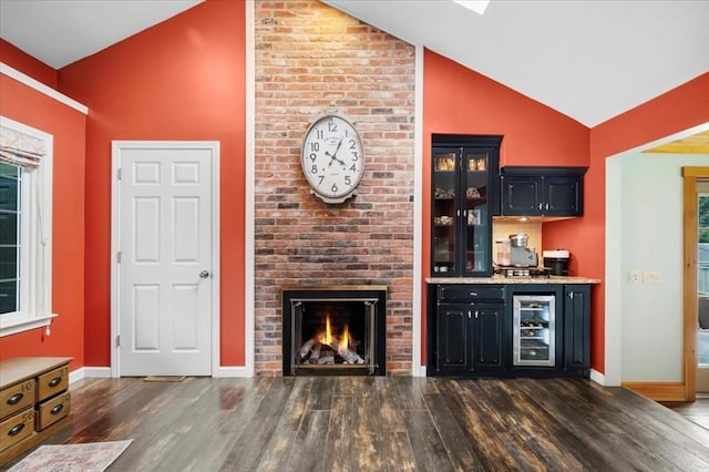 7 Scenic Dr, Wilbraham, MA 01095 - indoor dry bar with dark wood-type flooring, high vaulted ceiling, wine cooler, and a fireplace