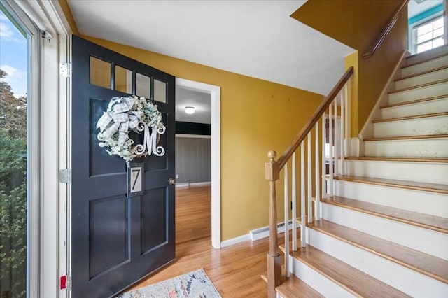 7 Scenic Dr, Wilbraham, MA 01095 - entryway featuring stairway, wood finished floors, and baseboard heating