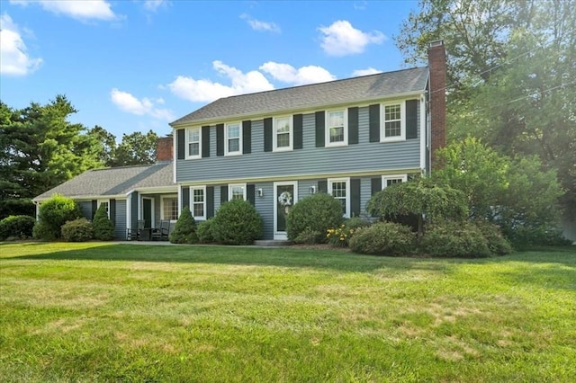 7 Scenic Dr, Wilbraham, MA 01095 - colonial house with a chimney and a front yard