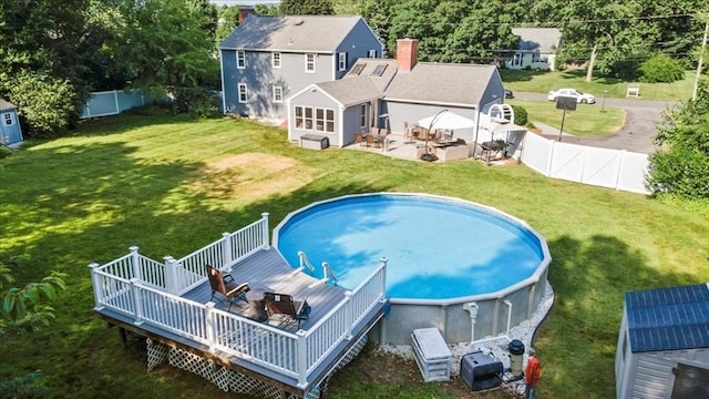 7 Scenic Dr, Wilbraham, MA 01095 - rear view of property with a deck, a fenced backyard, and a chimney