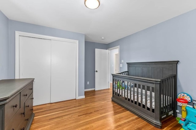 66 Barnum St, Taunton, MA 02780 - bedroom featuring light wood finished floors and a closet