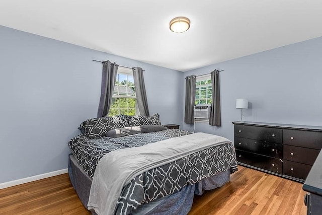 66 Barnum St, Taunton, MA 02780 - bedroom featuring wood finished floors and cooling unit
