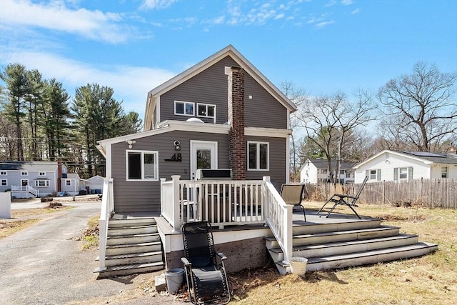 48 Whipple Rd, Billerica, MA 01821 - back of house with fence and a wooden deck