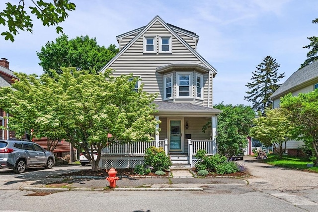 16 Desmond Ave, Manchester, MA 01944 - view of front facade featuring covered porch