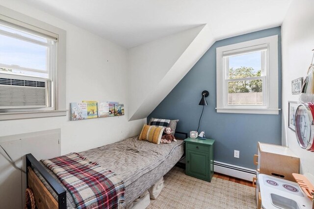 16 Desmond Ave, Manchester, MA 01944 - bedroom featuring a baseboard heating unit and light wood finished floors