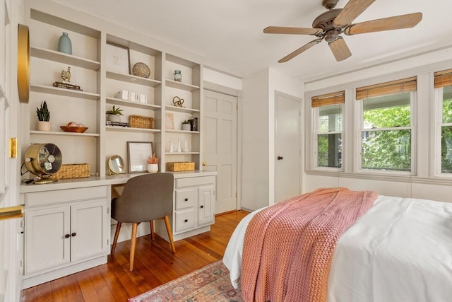 16 Desmond Ave, Manchester, MA 01944 - bedroom with built in study area, wood-type flooring, and ceiling fan