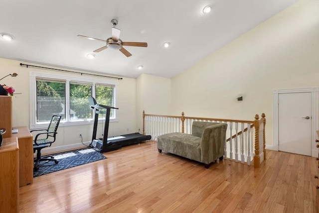 workout area featuring vaulted ceiling, ceiling fan, light wood-style flooring, baseboards, and recessed lighting