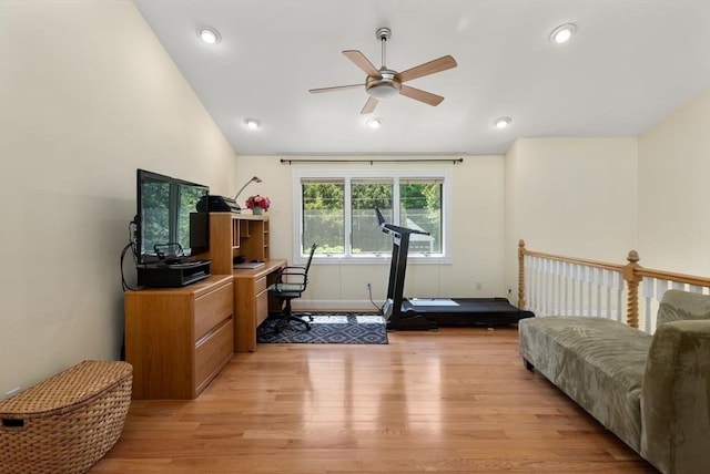 workout room with ceiling fan, light wood-style flooring, vaulted ceiling, baseboards, and recessed lighting