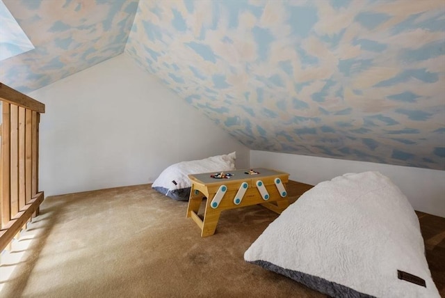 bedroom with carpet and lofted ceiling