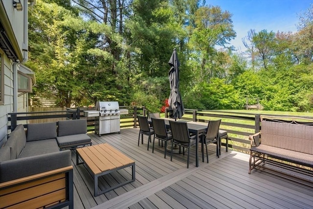 wooden deck with outdoor dining space and an outdoor living space