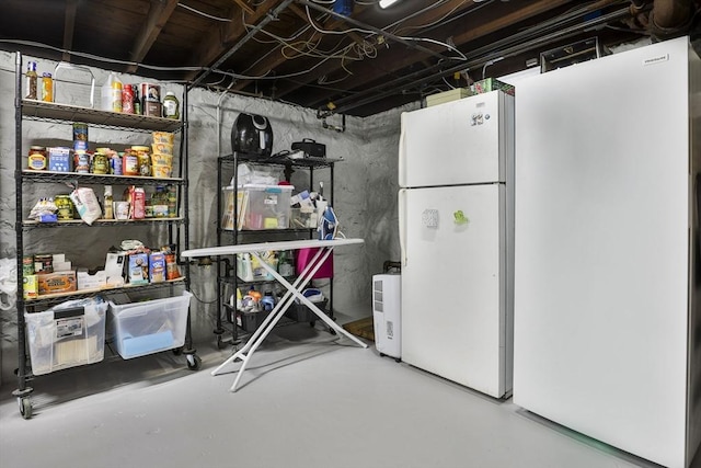 10 Hemenway St, Methuen, MA 01844 - unfinished below grade area with freestanding refrigerator