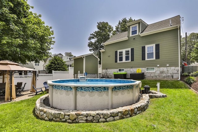 10 Hemenway St, Methuen, MA 01844 - view of pool with a gazebo, central air condition unit, and a storage shed
