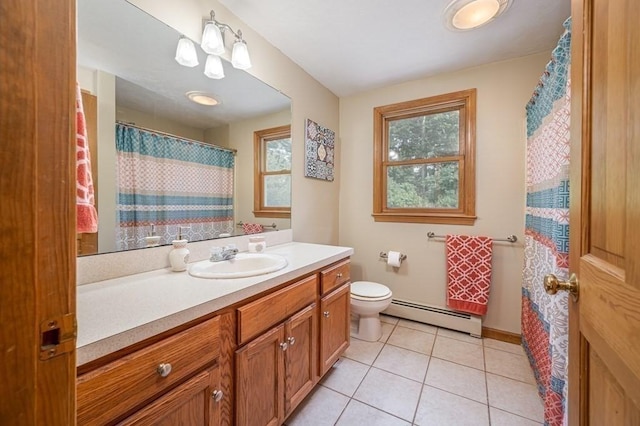 10 Tobin Dr, Dudley, MA 01571 - bathroom featuring a baseboard heating unit, vanity, and tile patterned floors