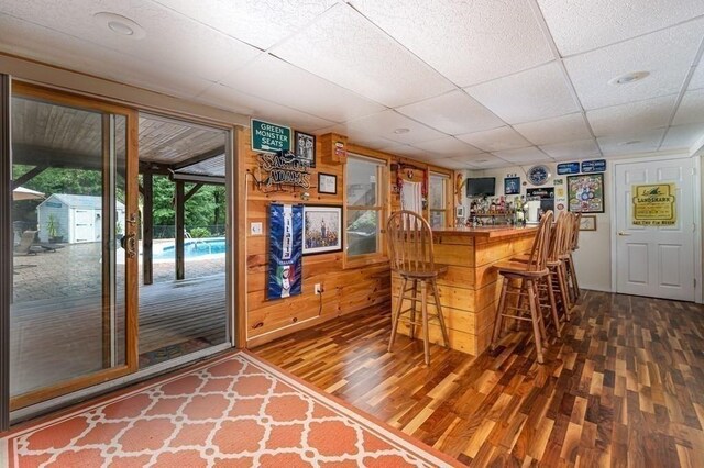 10 Tobin Dr, Dudley, MA 01571 - indoor dry bar with dark wood-style flooring and a paneled ceiling