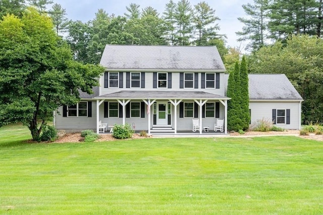 10 Tobin Dr, Dudley, MA 01571 - view of front facade featuring a front lawn and covered porch