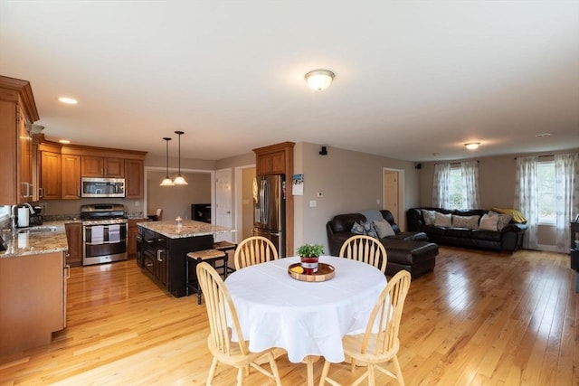 225 Salem Rd, Dracut, MA 01826 - dining area featuring light wood-type flooring