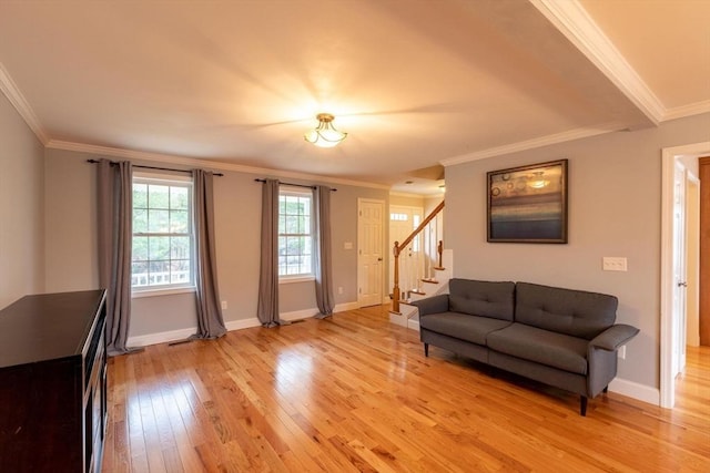 225 Salem Rd, Dracut, MA 01826 - living area featuring light wood-style flooring, crown molding, stairs, and baseboards
