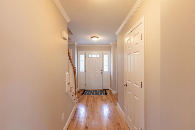 225 Salem Rd, Dracut, MA 01826 - entryway featuring light wood-type flooring, crown molding, and baseboards