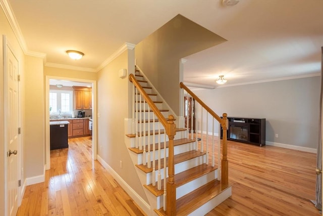 225 Salem Rd, Dracut, MA 01826 - stairway featuring hardwood / wood-style floors, crown molding, and baseboards