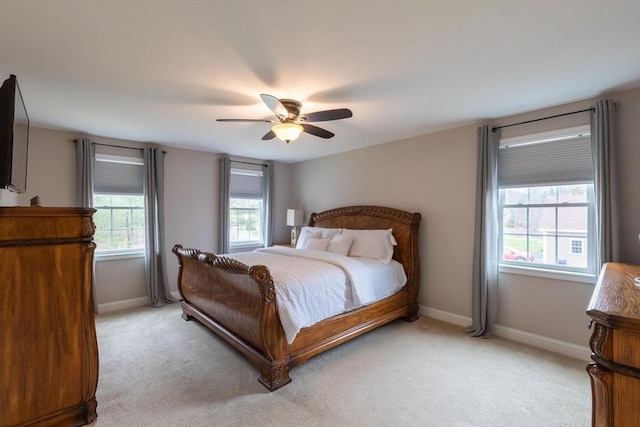 225 Salem Rd, Dracut, MA 01826 - bedroom with light colored carpet, baseboards, and a ceiling fan