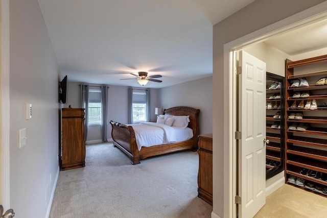 225 Salem Rd, Dracut, MA 01826 - carpeted bedroom featuring baseboards, ceiling fan, a closet, and a spacious closet