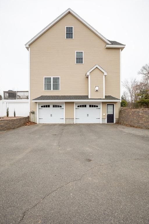 225 Salem Rd, Dracut, MA 01826 - view of home's exterior featuring driveway and a garage
