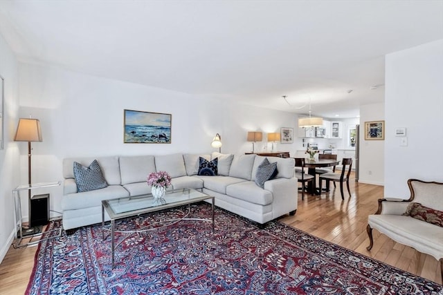 living area featuring light wood-style flooring