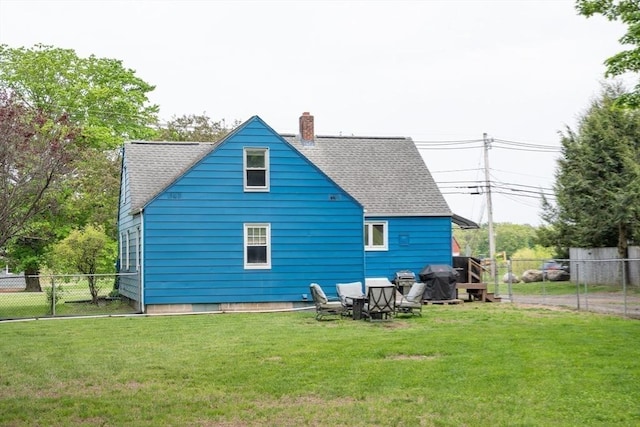 719 College Hwy, Southwick, MA 01077 - back of house featuring a shingled roof and a chimney