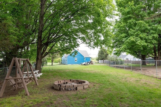 719 College Hwy, Southwick, MA 01077 - view of yard featuring a fire pit