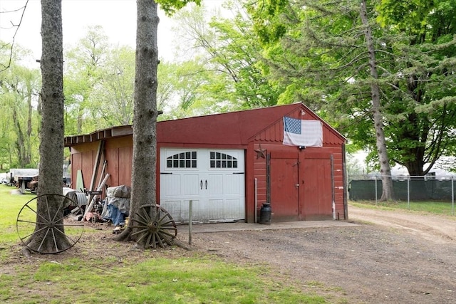 719 College Hwy, Southwick, MA 01077 - detached garage with driveway and fence