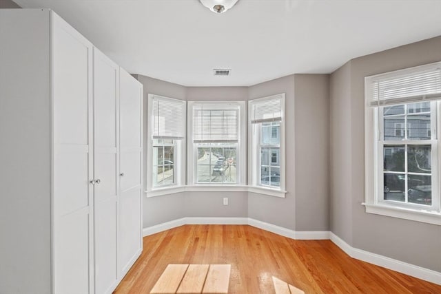 90 Litchfield Unit A, Boston, MA 02135 - unfurnished room featuring light wood-style floors and baseboards