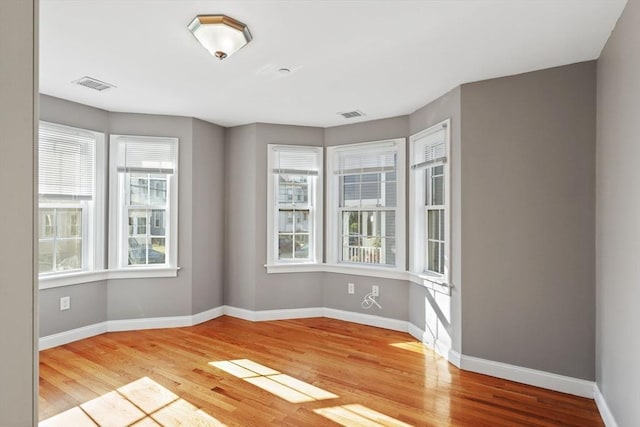 90 Litchfield Unit A, Boston, MA 02135 - empty room featuring light wood finished floors and baseboards