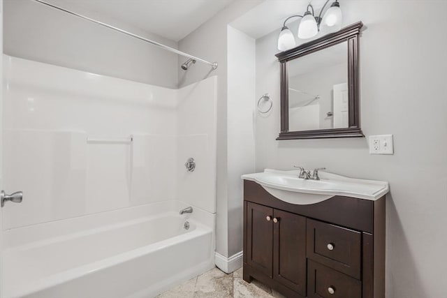 90 Litchfield Unit A, Boston, MA 02135 - bathroom with vanity, shower / tub combination, and baseboards