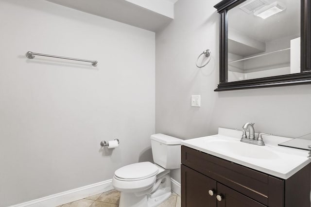 90 Litchfield Unit A, Boston, MA 02135 - full bath with baseboards, vanity, toilet, and tile patterned flooring