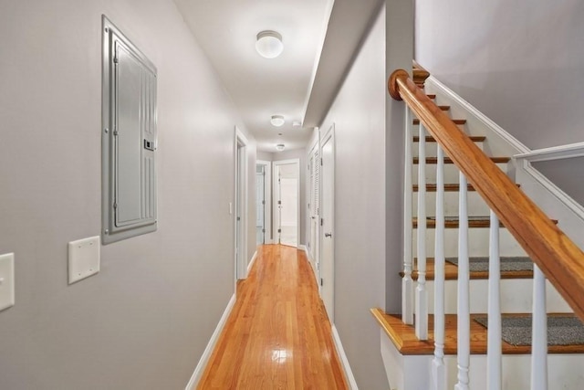 90 Litchfield Unit A, Boston, MA 02135 - hall featuring light wood-style flooring, stairs, and baseboards