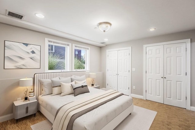 90 Litchfield Unit A, Boston, MA 02135 - bedroom with multiple closets, baseboards, and recessed lighting
