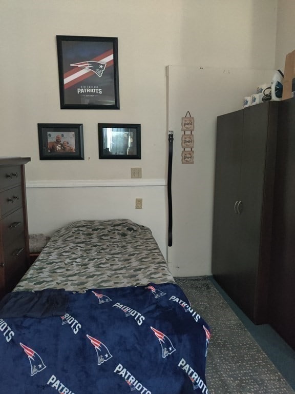 bedroom featuring carpet