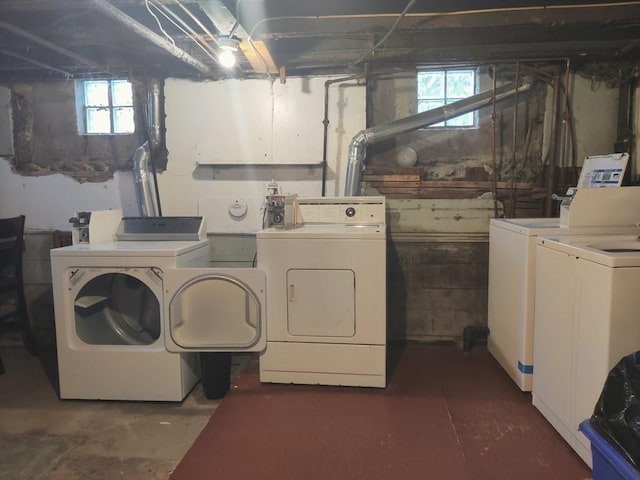 laundry room featuring laundry area and separate washer and dryer