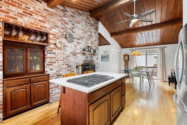 27 Johnson St, Malden, MA 02148 - kitchen featuring wooden ceiling, a ceiling fan, stainless steel appliances, light wood-style floors, and light countertops