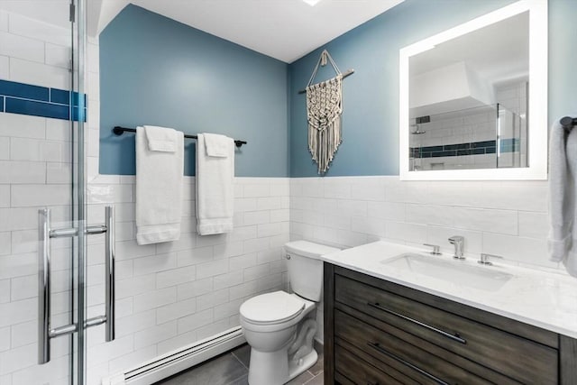 27 Johnson St, Malden, MA 02148 - full bath featuring baseboard heating, vanity, a stall shower, tile walls, and tile patterned floors