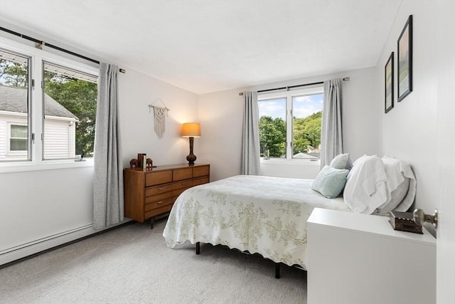 27 Johnson St, Malden, MA 02148 - carpeted bedroom with multiple windows and baseboard heating