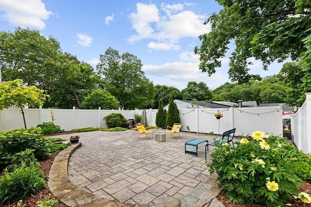 27 Johnson St, Malden, MA 02148 - fenced backyard with a patio area