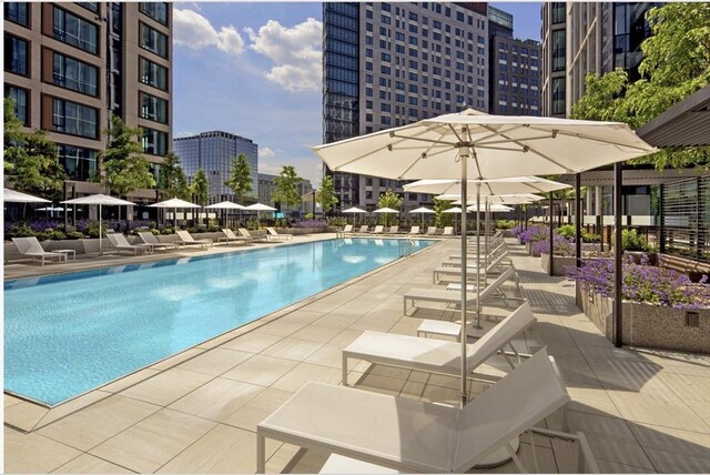 133 Seaport Blvd Unit 0920, Boston, MA 02210 - community pool with a patio and a city view